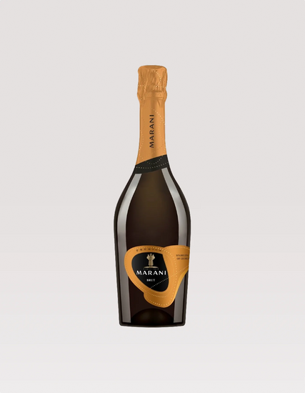 Bottle of Marani champagne with a gold foil cap on a light gray background